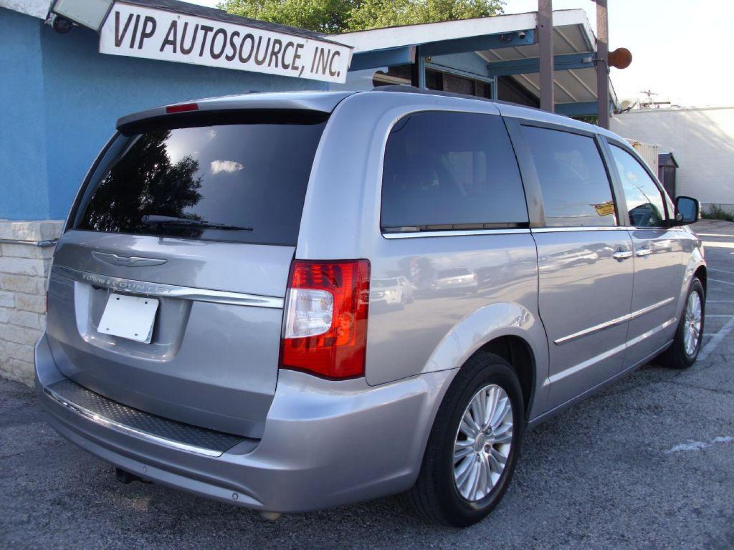 2013 SILVER CHRYSLER TOWN and COUNTRY TOURING L (2C4RC1CG6DR) with an 3.6L engine, Automatic transmission, located at 2215 Harry Wurzbach Rd , San Antonio, TX, 78209, (208) 269-7240, 29.491415, -98.432098 - POWER FOLDING THIRD ROW!! Parking Sensor; Blind Spot Monitor; Convenience Package; Cruise Control; Flex Fuel Vehicle; Fold Away Middle Row; Front Seat Heaters; Heated Steering Wheel; Leather Seats; Power Hatch/Deck Lid; Rear Air Conditioning; Air Conditioning; Power Windows; Power Locks; Power Steer - Photo#2