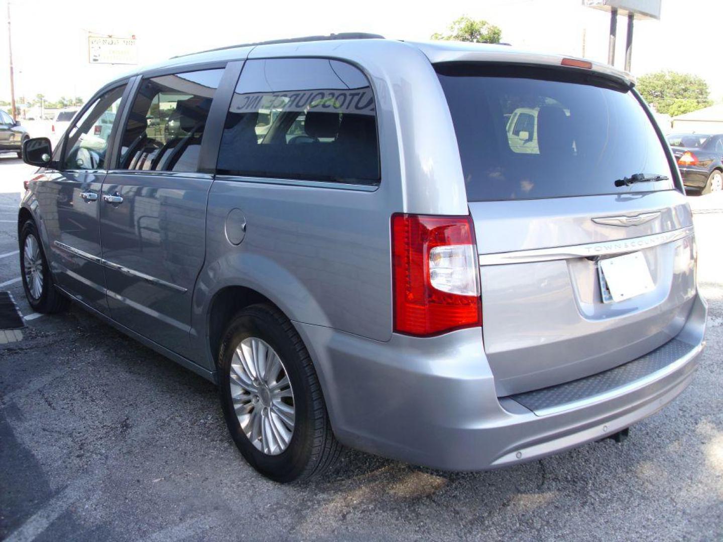 2013 SILVER CHRYSLER TOWN and COUNTRY TOURING L (2C4RC1CG6DR) with an 3.6L engine, Automatic transmission, located at 2215 Harry Wurzbach Rd , San Antonio, TX, 78209, (208) 269-7240, 29.491415, -98.432098 - POWER FOLDING THIRD ROW!! Parking Sensor; Blind Spot Monitor; Convenience Package; Cruise Control; Flex Fuel Vehicle; Fold Away Middle Row; Front Seat Heaters; Heated Steering Wheel; Leather Seats; Power Hatch/Deck Lid; Rear Air Conditioning; Air Conditioning; Power Windows; Power Locks; Power Steer - Photo#6