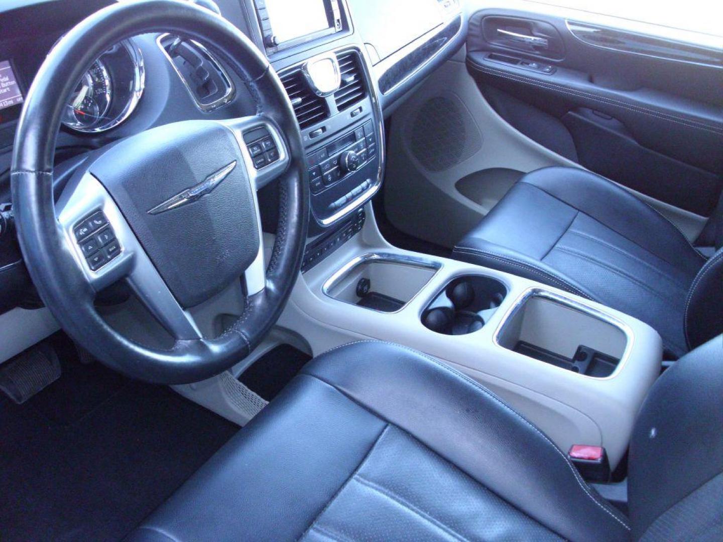 2013 SILVER CHRYSLER TOWN and COUNTRY TOURING L (2C4RC1CG6DR) with an 3.6L engine, Automatic transmission, located at 2215 Harry Wurzbach Rd , San Antonio, TX, 78209, (208) 269-7240, 29.491415, -98.432098 - POWER FOLDING THIRD ROW!! Parking Sensor; Blind Spot Monitor; Convenience Package; Cruise Control; Flex Fuel Vehicle; Fold Away Middle Row; Front Seat Heaters; Heated Steering Wheel; Leather Seats; Power Hatch/Deck Lid; Rear Air Conditioning; Air Conditioning; Power Windows; Power Locks; Power Steer - Photo#7