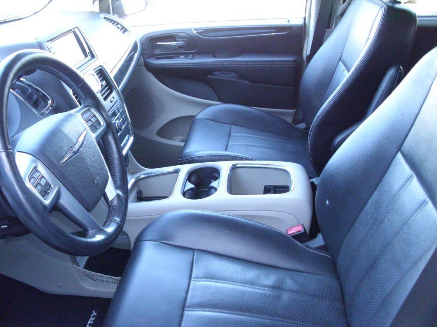 2013 SILVER CHRYSLER TOWN and COUNTRY TOURING L (2C4RC1CG6DR) with an 3.6L engine, Automatic transmission, located at 2215 Harry Wurzbach Rd , San Antonio, TX, 78209, (208) 269-7240, 29.491415, -98.432098 - POWER FOLDING THIRD ROW!! Parking Sensor; Blind Spot Monitor; Convenience Package; Cruise Control; Flex Fuel Vehicle; Fold Away Middle Row; Front Seat Heaters; Heated Steering Wheel; Leather Seats; Power Hatch/Deck Lid; Rear Air Conditioning; Air Conditioning; Power Windows; Power Locks; Power Steer - Photo#8