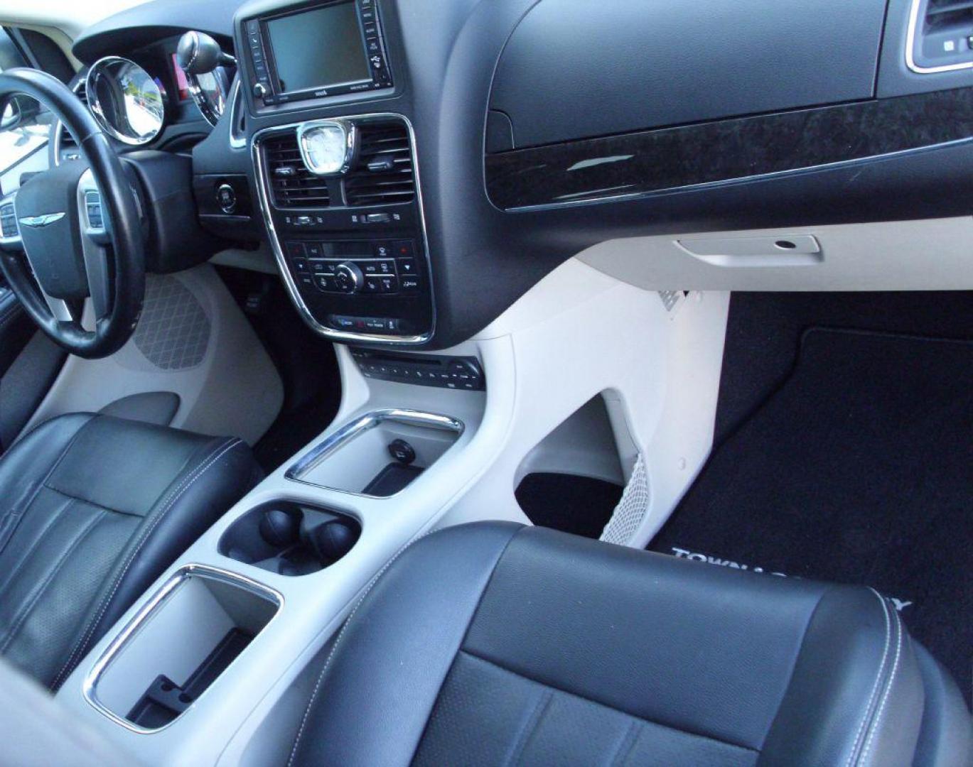 2013 SILVER CHRYSLER TOWN and COUNTRY TOURING L (2C4RC1CG6DR) with an 3.6L engine, Automatic transmission, located at 2215 Harry Wurzbach Rd , San Antonio, TX, 78209, (208) 269-7240, 29.491415, -98.432098 - POWER FOLDING THIRD ROW!! Parking Sensor; Blind Spot Monitor; Convenience Package; Cruise Control; Flex Fuel Vehicle; Fold Away Middle Row; Front Seat Heaters; Heated Steering Wheel; Leather Seats; Power Hatch/Deck Lid; Rear Air Conditioning; Air Conditioning; Power Windows; Power Locks; Power Steer - Photo#9
