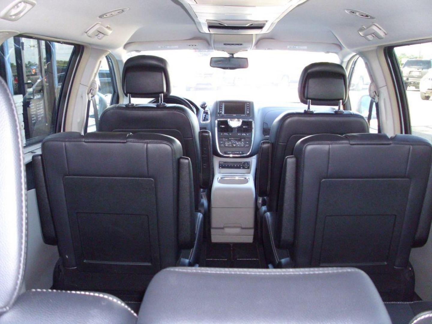 2013 SILVER CHRYSLER TOWN and COUNTRY TOURING L (2C4RC1CG6DR) with an 3.6L engine, Automatic transmission, located at 2215 Harry Wurzbach Rd , San Antonio, TX, 78209, (208) 269-7240, 29.491415, -98.432098 - POWER FOLDING THIRD ROW!! Parking Sensor; Blind Spot Monitor; Convenience Package; Cruise Control; Flex Fuel Vehicle; Fold Away Middle Row; Front Seat Heaters; Heated Steering Wheel; Leather Seats; Power Hatch/Deck Lid; Rear Air Conditioning; Air Conditioning; Power Windows; Power Locks; Power Steer - Photo#18
