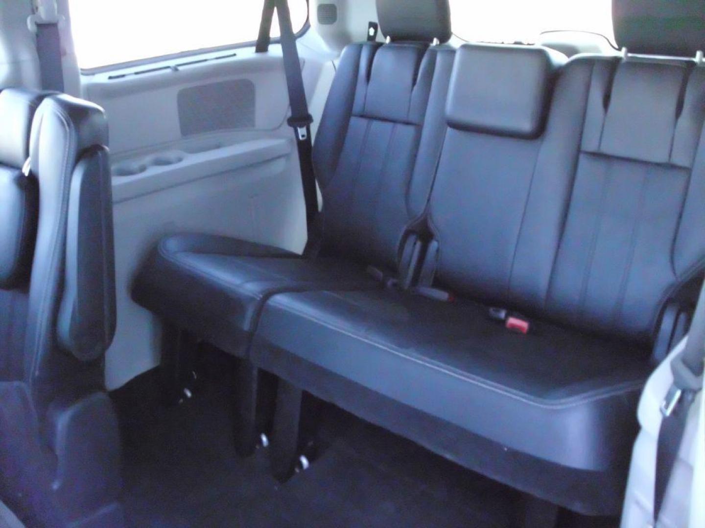 2013 SILVER CHRYSLER TOWN and COUNTRY TOURING L (2C4RC1CG6DR) with an 3.6L engine, Automatic transmission, located at 2215 Harry Wurzbach Rd , San Antonio, TX, 78209, (208) 269-7240, 29.491415, -98.432098 - POWER FOLDING THIRD ROW!! Parking Sensor; Blind Spot Monitor; Convenience Package; Cruise Control; Flex Fuel Vehicle; Fold Away Middle Row; Front Seat Heaters; Heated Steering Wheel; Leather Seats; Power Hatch/Deck Lid; Rear Air Conditioning; Air Conditioning; Power Windows; Power Locks; Power Steer - Photo#20