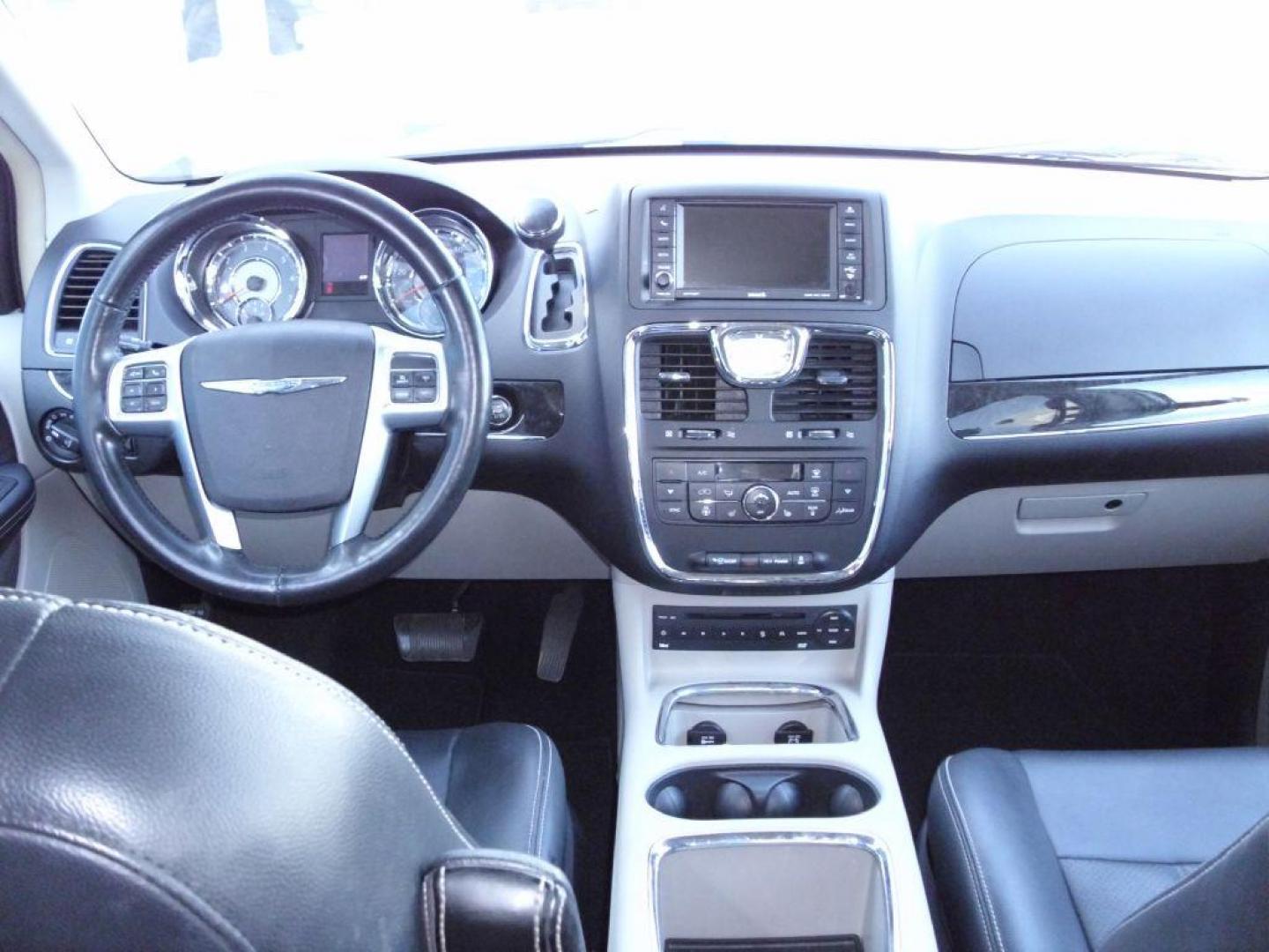 2013 SILVER CHRYSLER TOWN and COUNTRY TOURING L (2C4RC1CG6DR) with an 3.6L engine, Automatic transmission, located at 2215 Harry Wurzbach Rd , San Antonio, TX, 78209, (208) 269-7240, 29.491415, -98.432098 - POWER FOLDING THIRD ROW!! Parking Sensor; Blind Spot Monitor; Convenience Package; Cruise Control; Flex Fuel Vehicle; Fold Away Middle Row; Front Seat Heaters; Heated Steering Wheel; Leather Seats; Power Hatch/Deck Lid; Rear Air Conditioning; Air Conditioning; Power Windows; Power Locks; Power Steer - Photo#21