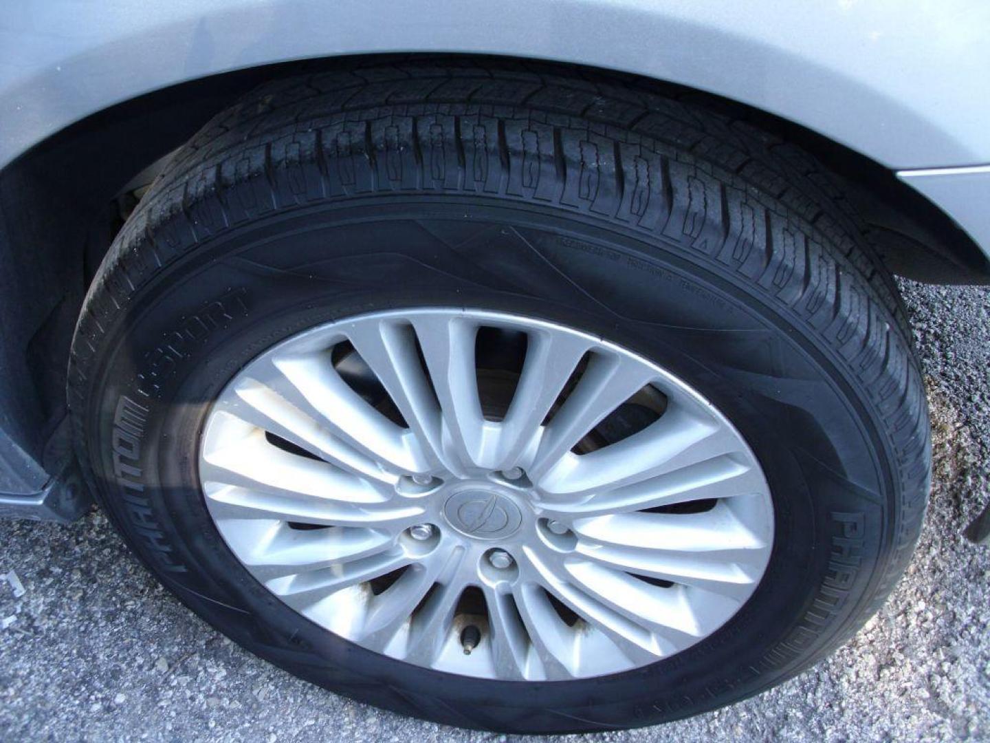 2013 SILVER CHRYSLER TOWN and COUNTRY TOURING L (2C4RC1CG6DR) with an 3.6L engine, Automatic transmission, located at 2215 Harry Wurzbach Rd , San Antonio, TX, 78209, (208) 269-7240, 29.491415, -98.432098 - POWER FOLDING THIRD ROW!! Parking Sensor; Blind Spot Monitor; Convenience Package; Cruise Control; Flex Fuel Vehicle; Fold Away Middle Row; Front Seat Heaters; Heated Steering Wheel; Leather Seats; Power Hatch/Deck Lid; Rear Air Conditioning; Air Conditioning; Power Windows; Power Locks; Power Steer - Photo#28