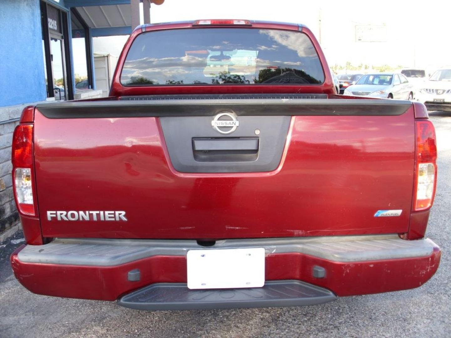 2018 RED NISSAN FRONTIER S (1N6DD0ER3JN) with an 4.0L engine, Automatic transmission - NEW TIRES!! Bluetooth Technology; Cloth Seats; Bed Liner; Rear View Camera; Air Conditioning; Power Windows; Power Locks; Power Steering; Tilt Wheel; AM/FM CD/MP3; Satellite; Immobilizer; Keyless Entry; Dual Front Airbags; Side Airbags; Head Airbags; Rear Head Airbags; Active Seatbelts; Crew Cab; Re- Photo#4