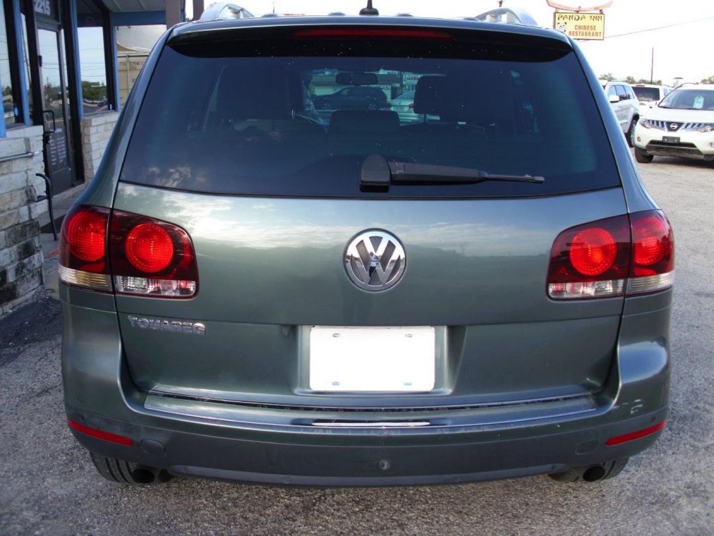 2008 GREEN VOLKSWAGEN TOUAREG 2 VR6 FSI (WVGBE77L48D) with an 3.6L engine, Automatic transmission, located at 2215 Harry Wurzbach Rd , San Antonio, TX, 78209, (208) 269-7240, 29.491415, -98.432098 - ALL WHEEL DRIVE WITH ALLOY WHEELS!! Automatic Transmission; Parking Sensors; Leatherette Seats; Power Hatch/Deck Lid; Air Conditioning; Power Windows; Power Locks; Power Steering; Tilt Wheel; AM/FM CD; Satellite; Immobilizer; Keyless Entry; Alarm; Daytime Running Lights; Dual Air Bags Front Head and- Photo#3