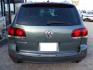 2008 GREEN VOLKSWAGEN TOUAREG 2 VR6 FSI (WVGBE77L48D) with an 3.6L engine, Automatic transmission, located at 2215 Harry Wurzbach Rd , San Antonio, TX, 78209, (208) 269-7240, 29.491415, -98.432098 - ALL WHEEL DRIVE WITH ALLOY WHEELS!! Automatic Transmission; Parking Sensors; Leatherette Seats; Power Hatch/Deck Lid; Air Conditioning; Power Windows; Power Locks; Power Steering; Tilt Wheel; AM/FM CD; Satellite; Immobilizer; Keyless Entry; Alarm; Daytime Running Lights; Dual Air Bags Front Head and- Photo#3