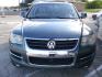 2008 GREEN VOLKSWAGEN TOUAREG 2 VR6 FSI (WVGBE77L48D) with an 3.6L engine, Automatic transmission, located at 2215 Harry Wurzbach Rd , San Antonio, TX, 78209, (208) 269-7240, 29.491415, -98.432098 - ALL WHEEL DRIVE WITH ALLOY WHEELS!! Automatic Transmission; Parking Sensors; Leatherette Seats; Power Hatch/Deck Lid; Air Conditioning; Power Windows; Power Locks; Power Steering; Tilt Wheel; AM/FM CD; Satellite; Immobilizer; Keyless Entry; Alarm; Daytime Running Lights; Dual Air Bags Front Head and- Photo#5