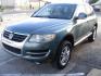 2008 GREEN VOLKSWAGEN TOUAREG 2 VR6 FSI (WVGBE77L48D) with an 3.6L engine, Automatic transmission, located at 2215 Harry Wurzbach Rd , San Antonio, TX, 78209, (208) 269-7240, 29.491415, -98.432098 - ALL WHEEL DRIVE WITH ALLOY WHEELS!! Automatic Transmission; Parking Sensors; Leatherette Seats; Power Hatch/Deck Lid; Air Conditioning; Power Windows; Power Locks; Power Steering; Tilt Wheel; AM/FM CD; Satellite; Immobilizer; Keyless Entry; Alarm; Daytime Running Lights; Dual Air Bags Front Head and- Photo#6